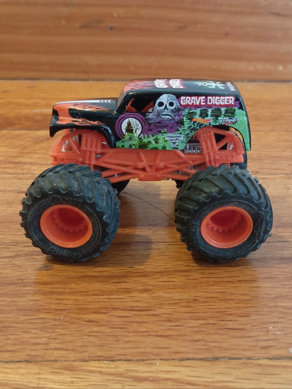 Hot Wheels Monster Jam Truck Grave Digger Orange Frame Diecast 1:64